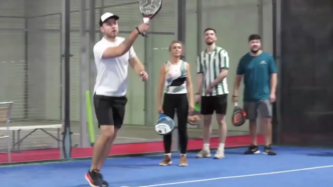 Players waiting their turn during a drill at an OSU Padel Saturday Social